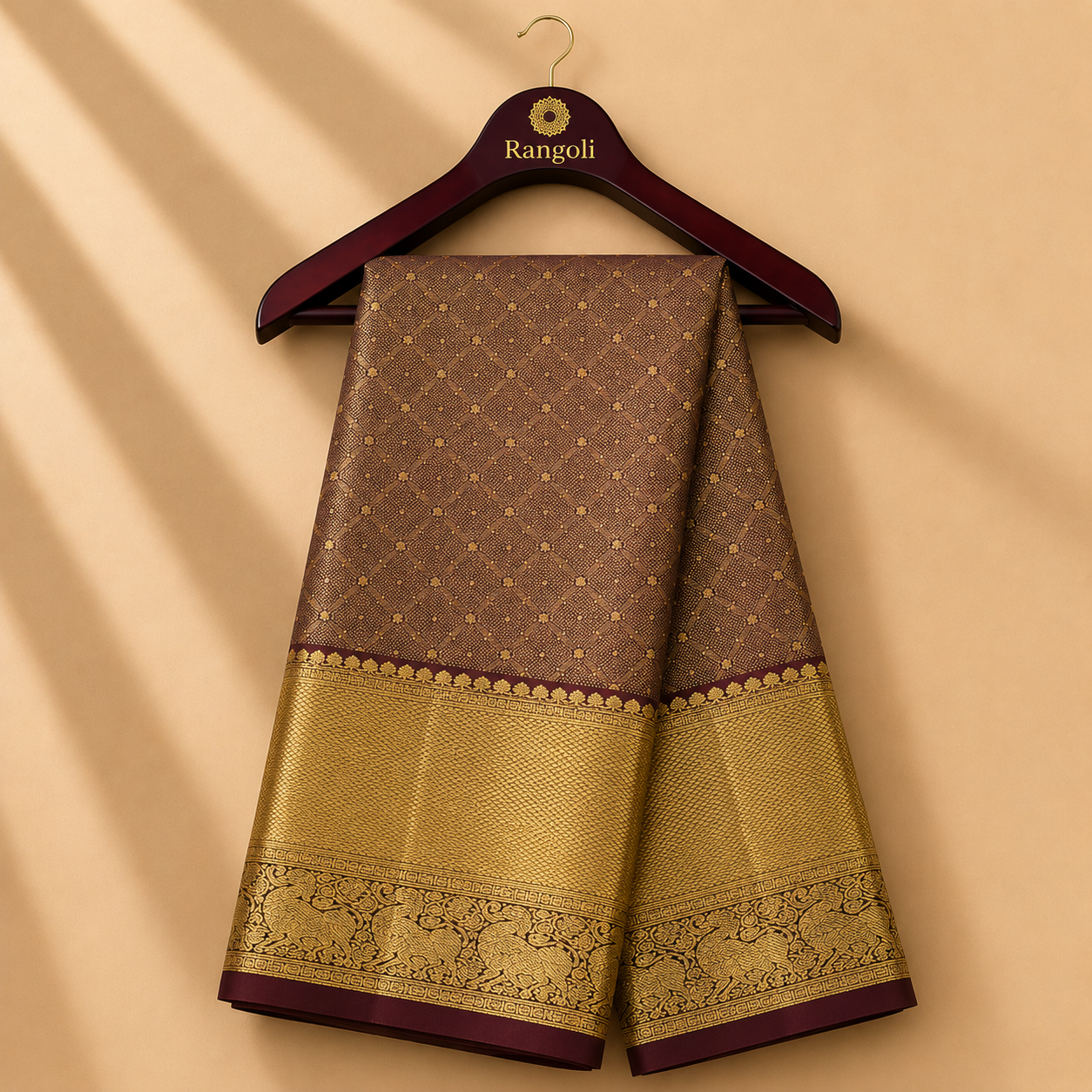Brown Kanchi Pattu Silk Saree with Grand Gold Zari Elephant Border