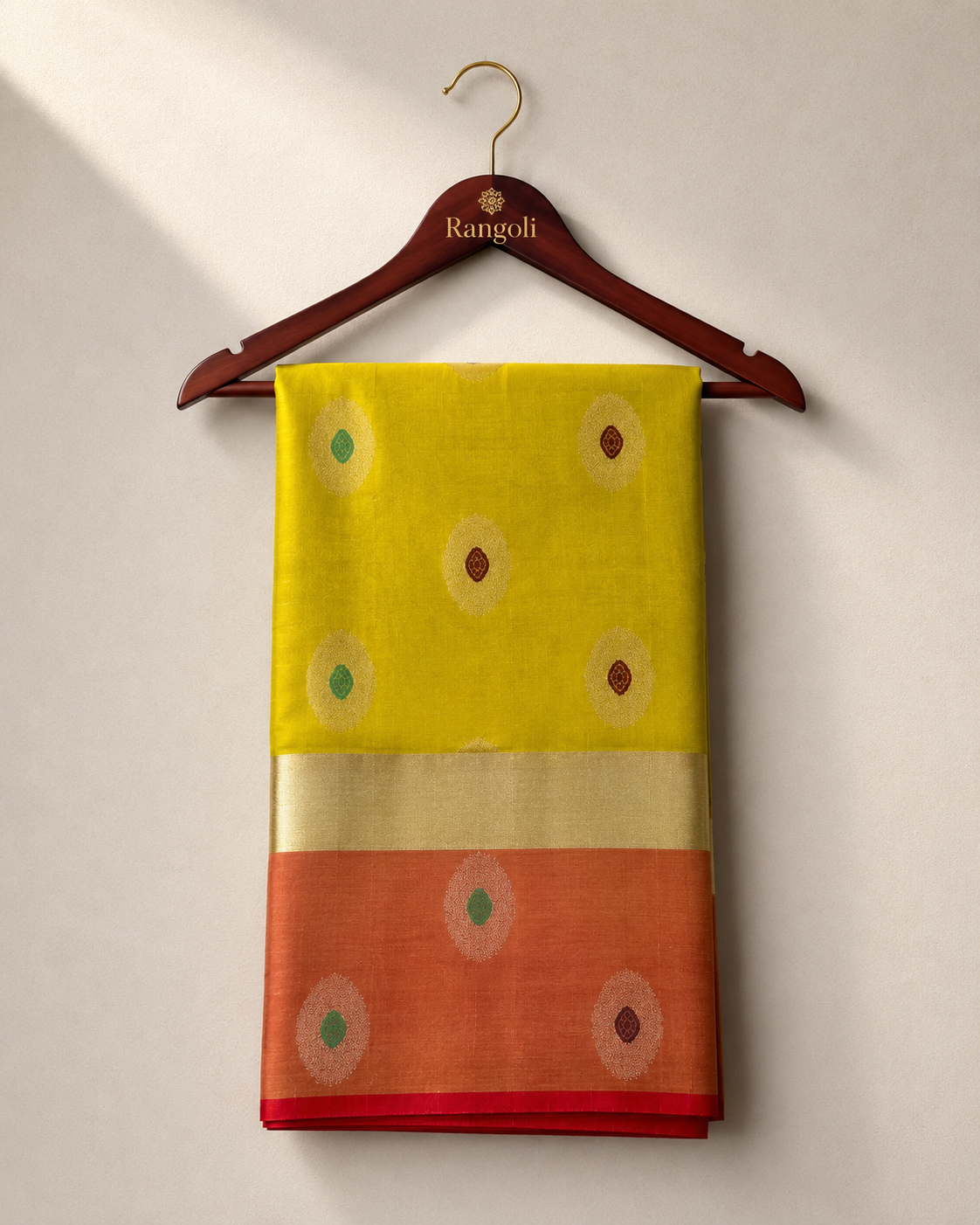 Radiate timeless elegance in this vibrant silk saree, adorned with delicate zari buttas and a rich contrasting zari border for a graceful traditional look.