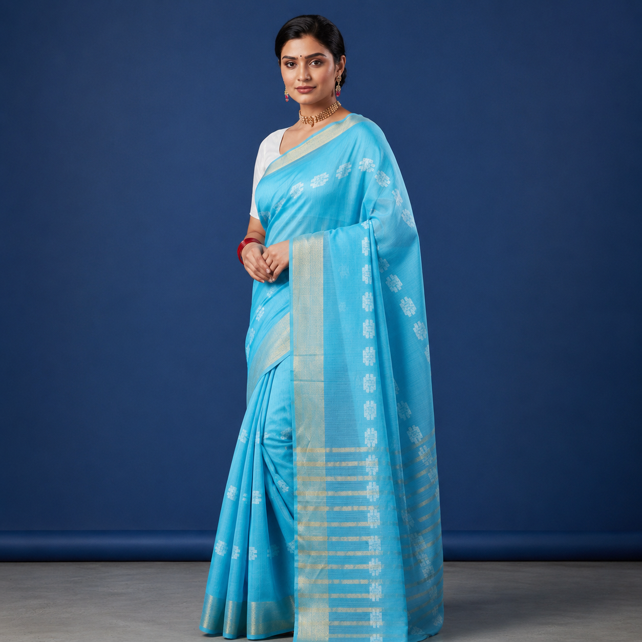 Graceful sky blue cotton saree featuring delicate woven motifs and an elegant silver-toned border for a timeless ethnic look. 💙✨