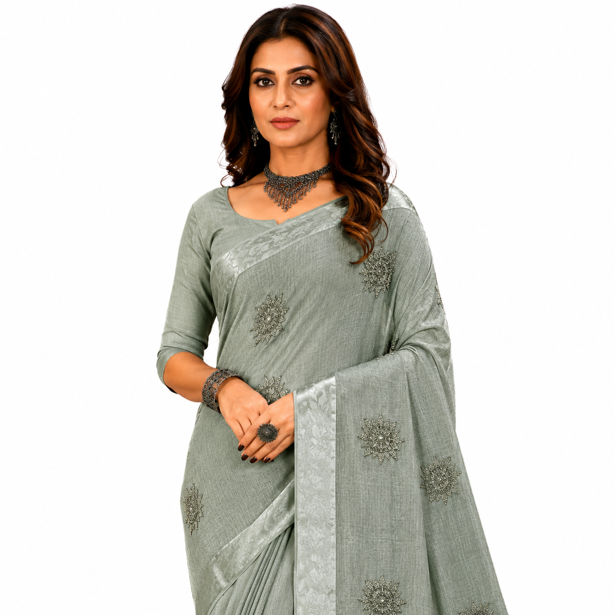 Graceful designer saree featuring delicate embroidered motifs and a refined woven texture for an effortlessly sophisticated look.