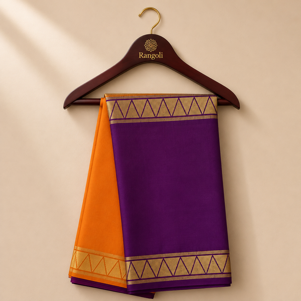 Royal purple and ochre orange Mysore Silk saree featuring a striking dual-tone design with traditional geometric zari borders.