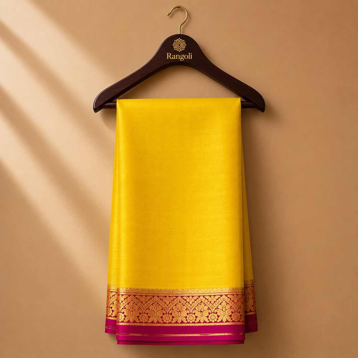 Bright yellow Mysore Silk saree accented with a rich deep pink zari border for a vibrant traditional look.