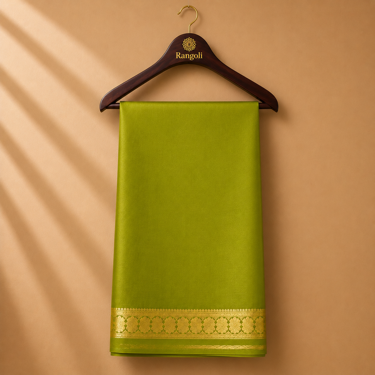 Vibrant olive green Mysore Silk saree featuring a lustrous finish and an elegant gold zari floral border.