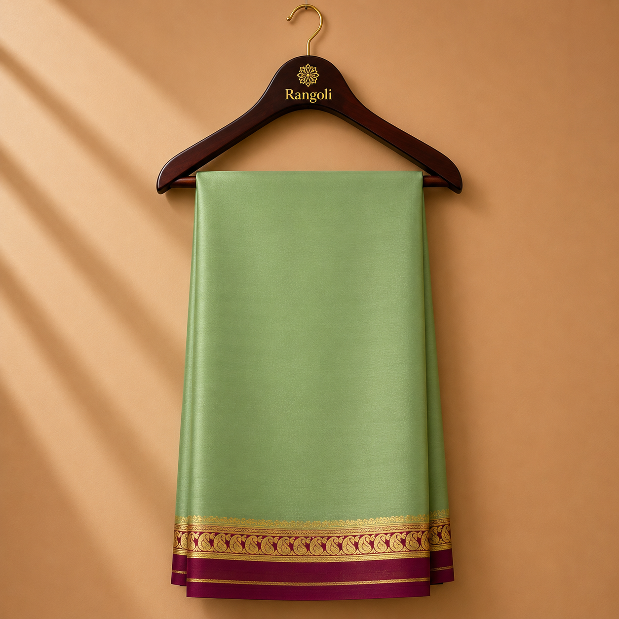 Pastel mint green Mysore Silk saree featuring a lustrous finish and an elegant magenta zari border.