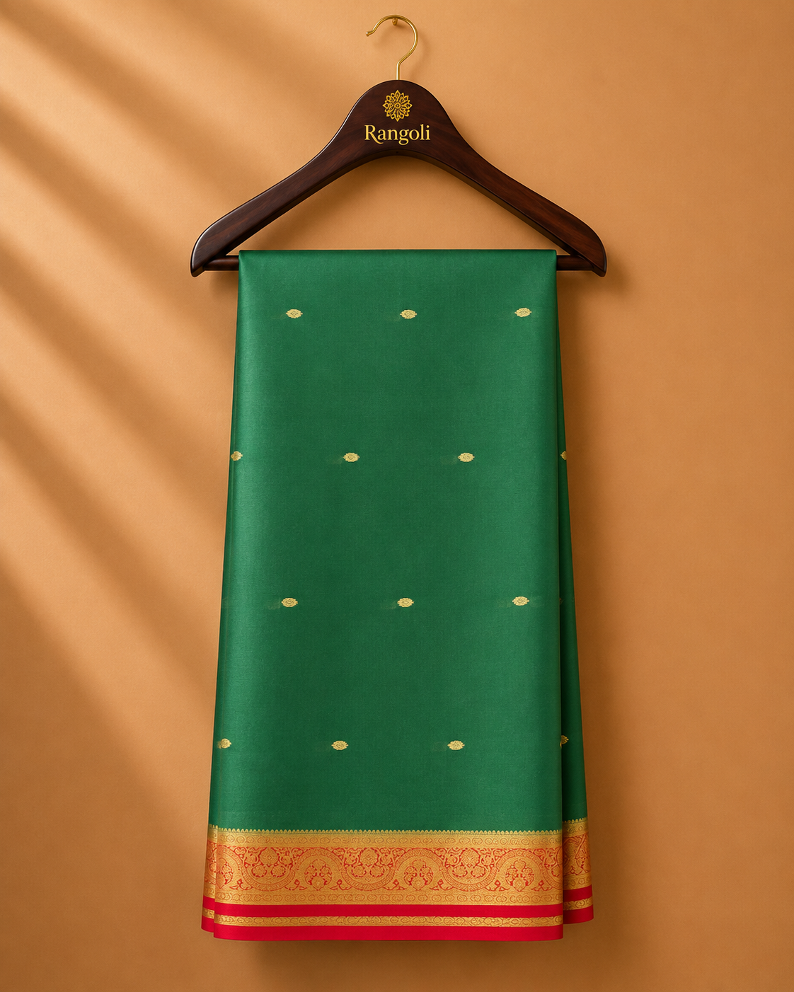 Forest green Mysore Silk saree featuring delicate gold zari buttas and a rich gold zari border with vibrant red accents.