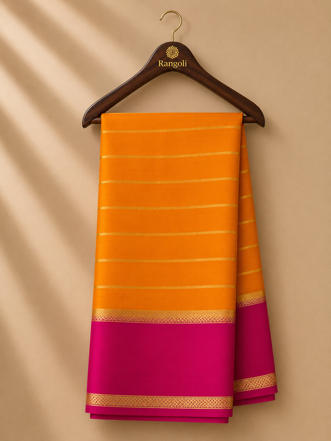 Vibrant mustard yellow Mysore silk saree featuring elegant gold zari stripes and a striking magenta contrast border for a festive traditional look.