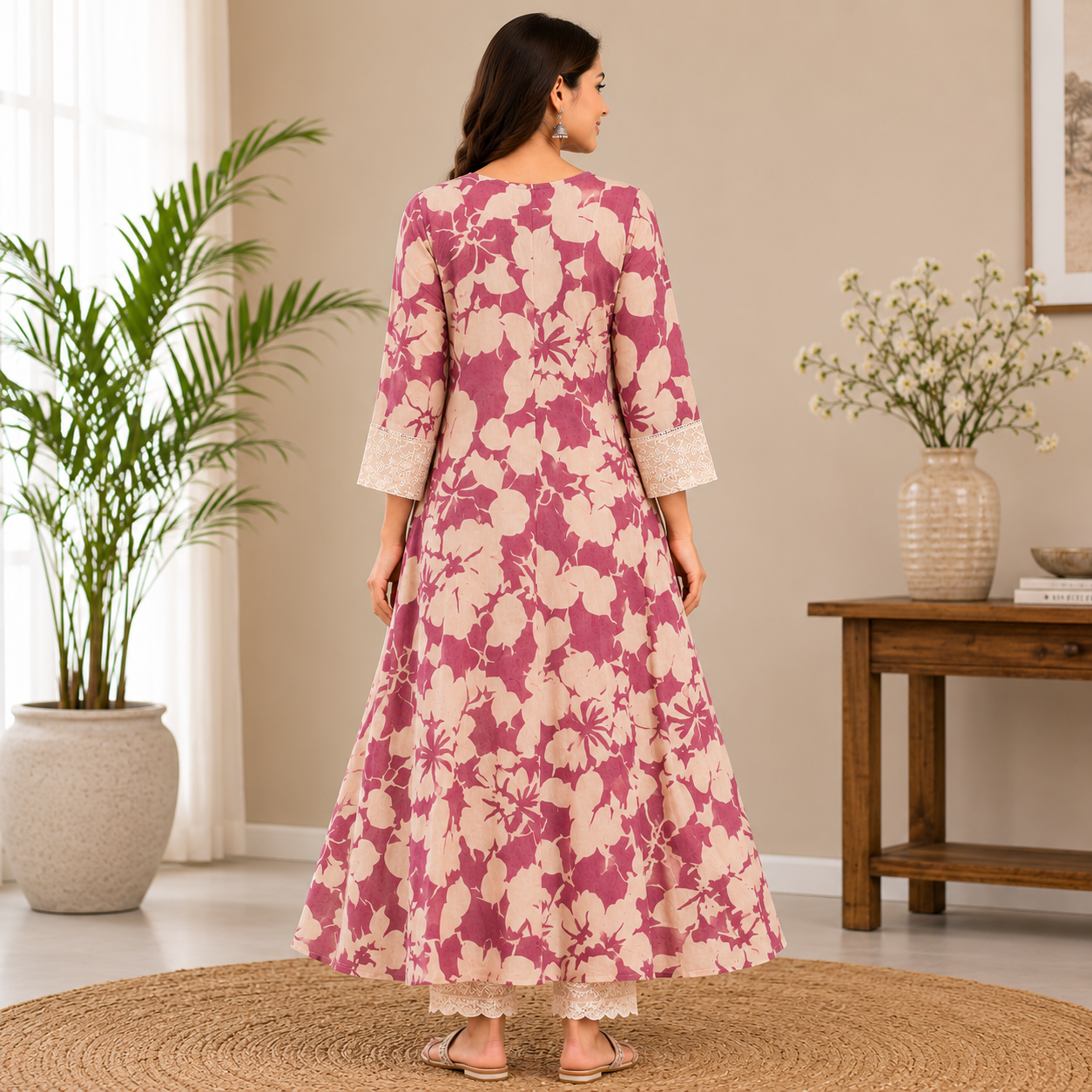 Mauve floral printed A-line kurta featuring delicate lace sleeve detailing and a graceful flowy silhouette for effortless elegance.