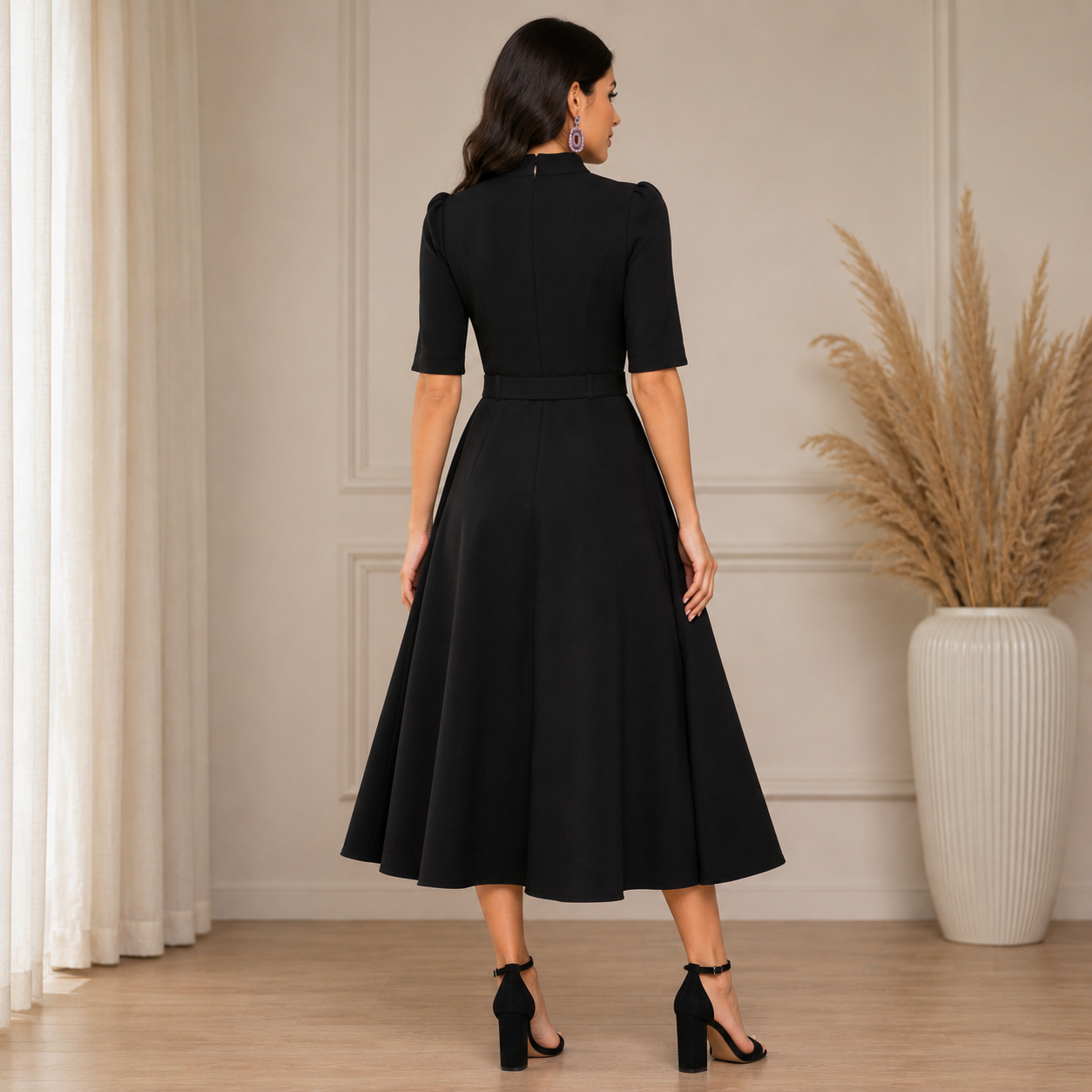 Elegant black fit-and-flare midi dress with a high neckline and timeless sophisticated silhouette.