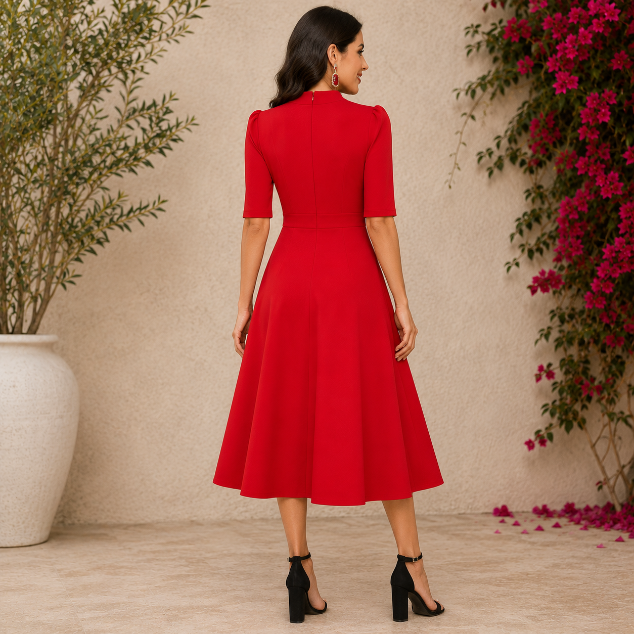 Elegant red fit-and-flare midi dress with a high neckline and timeless feminine charm.