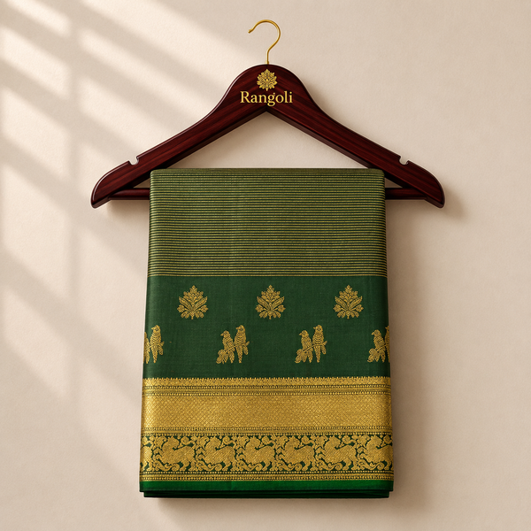 Kanchipattu deep forest green saree with fine striped weaving and rich gold zari border for a classic traditional look.