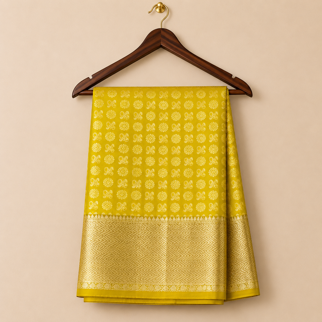 Elegant chartreuse Kanchipattu saree featuring delicate gold zari motifs with a rich woven gold zari border for a graceful festive look.
