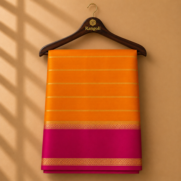 Vibrant mustard yellow Mysore silk saree featuring elegant gold zari stripes and a striking magenta contrast border for a festive traditional look.