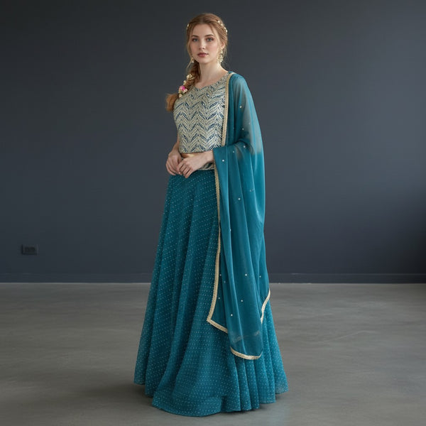 Shimmering Teal Lehenga with Silver Sequined Blouse